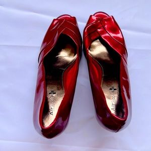 Red 4:0 high heels, man made upper, new.